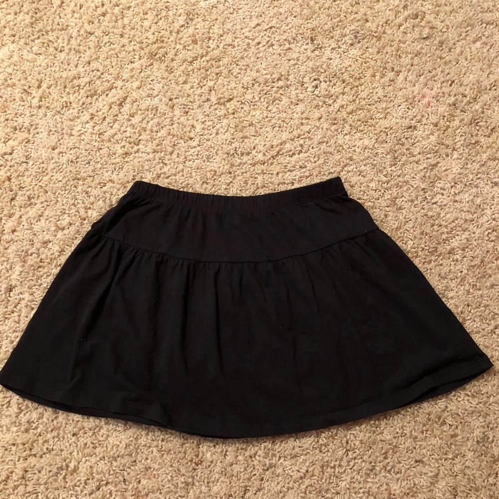 A plain black soft material skirt